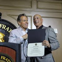 Frankie Sands Inducted into the Friars Club being presented with his Certificate by Bill Boggs.